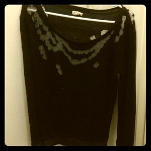 Distressed knit sweater